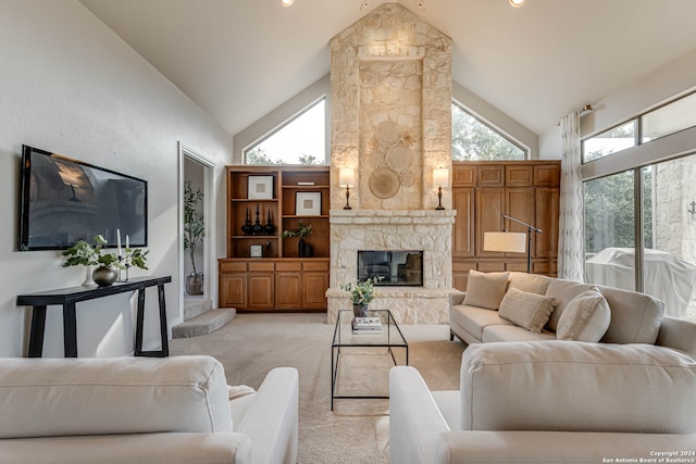 carpeted living room featuring high vaulted ceiling and a fireplace