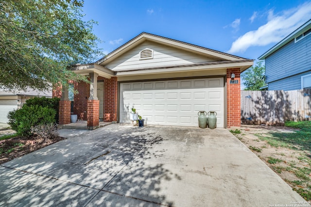 single story home featuring a garage