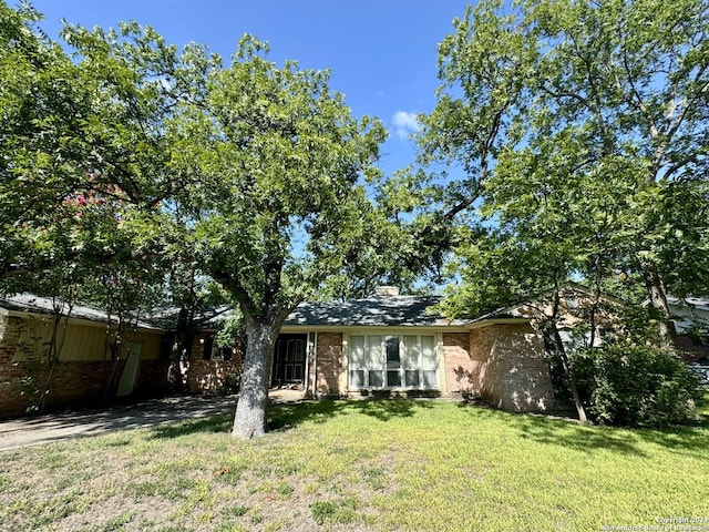 view of front of home with a front yard