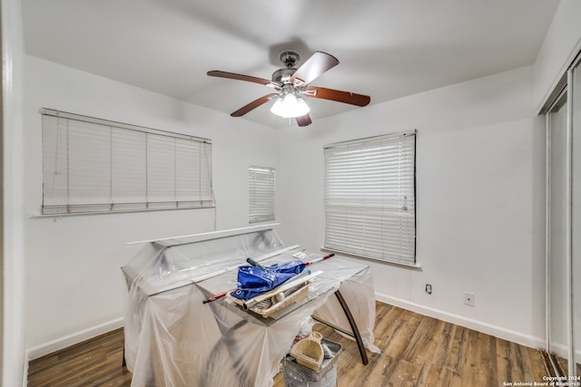 dining area featuring dark hardwood / wood-style floors and ceiling fan