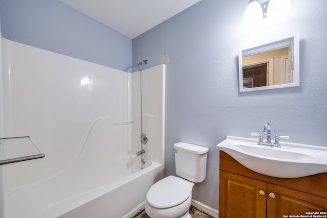 full bathroom featuring shower / bathtub combination, vanity, and toilet