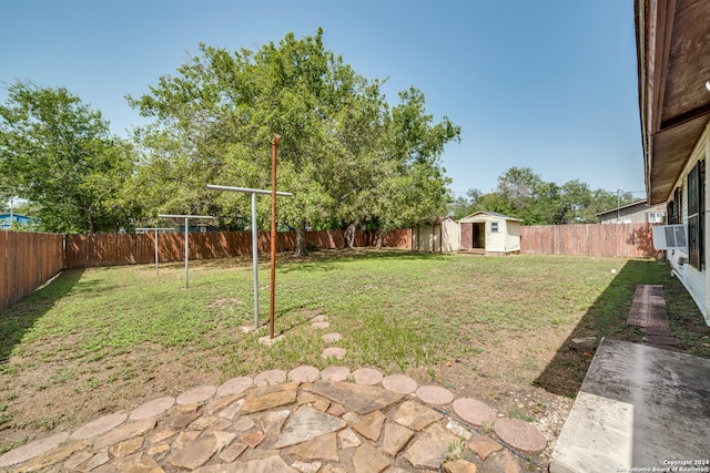 view of yard with a storage shed