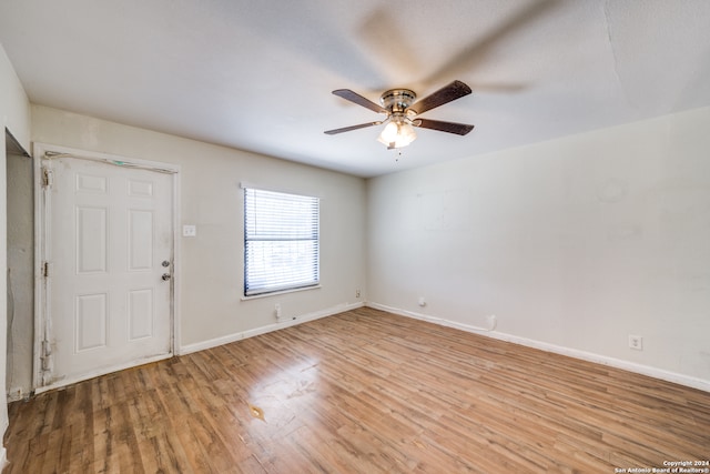 interior space with light hardwood / wood-style flooring and ceiling fan