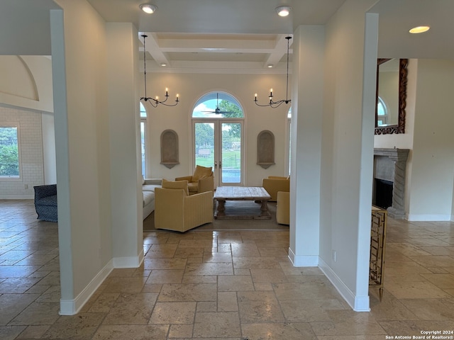 interior space featuring beamed ceiling and a notable chandelier