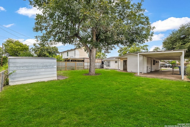 view of yard with a carport