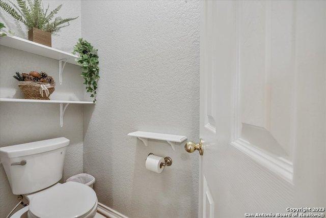 bathroom featuring toilet