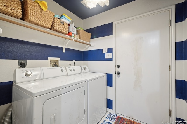 laundry area featuring laundry area and washer and clothes dryer