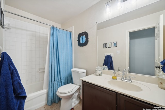 bathroom featuring shower / bath combo, vanity, toilet, and tile patterned floors