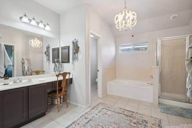 full bathroom featuring a chandelier, a shower stall, and tile patterned floors