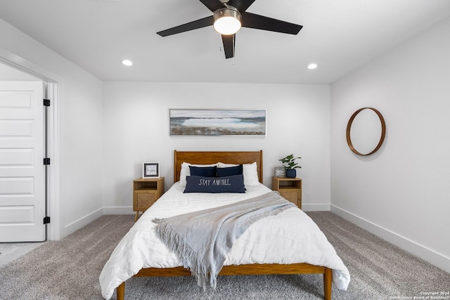 carpeted bedroom featuring ceiling fan