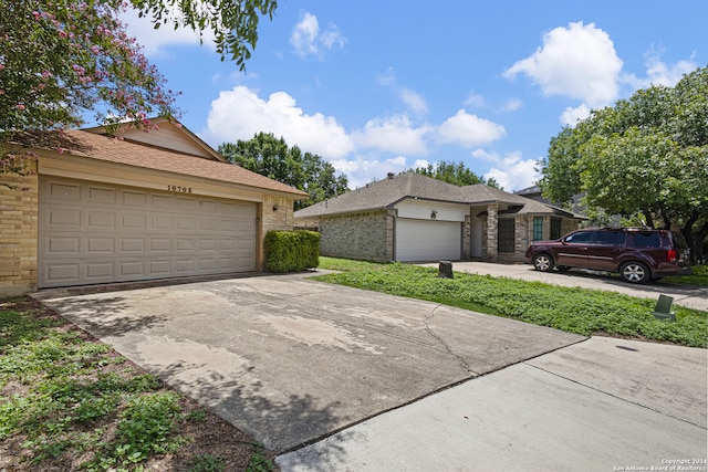 ranch-style home with a garage