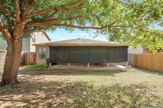 back of property with a patio area