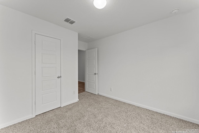 unfurnished bedroom with carpet flooring