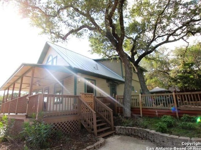 view of front of property featuring a wooden deck