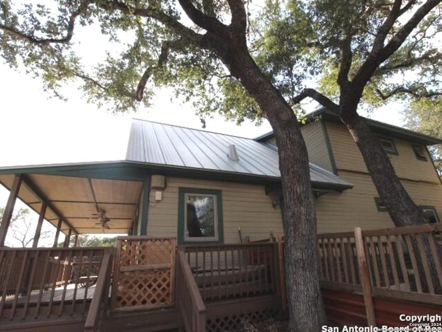 rear view of house with a deck