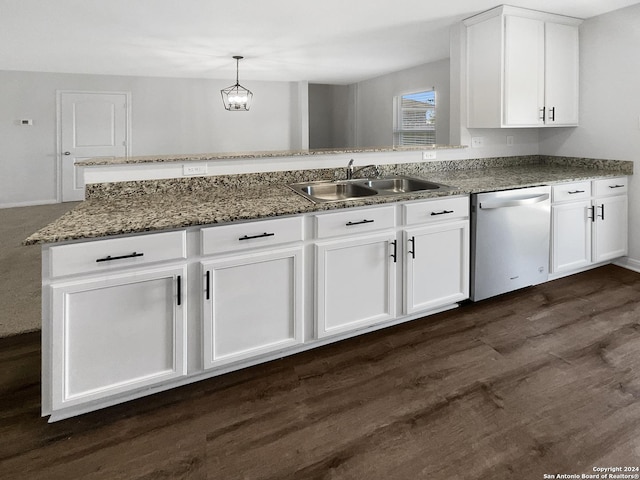 kitchen with white cabinetry, sink, decorative light fixtures, and dishwasher