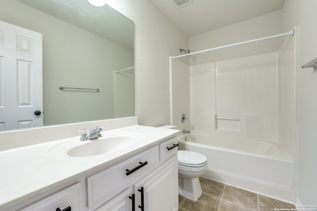 full bathroom with vanity, washtub / shower combination, tile patterned flooring, and toilet