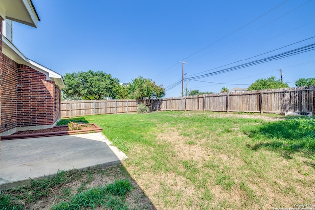 view of yard with a patio area