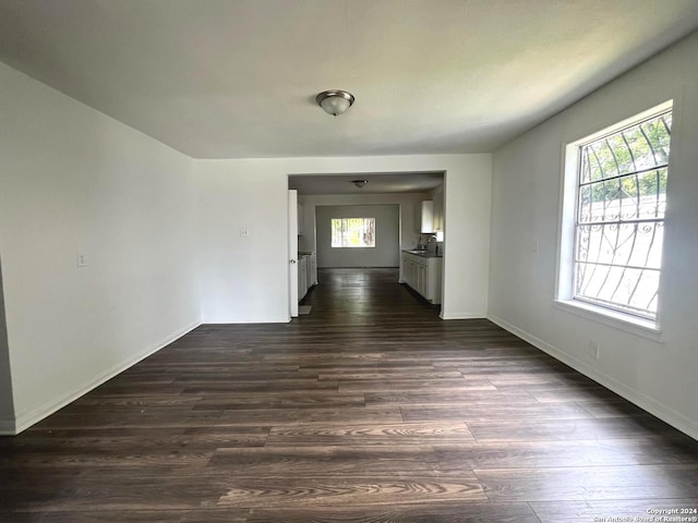 unfurnished living room with hardwood / wood-style floors