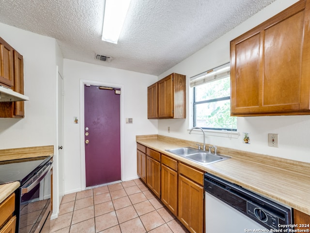 kitchen with range with electric cooktop, sink, a textured ceiling, light tile patterned flooring, and dishwasher