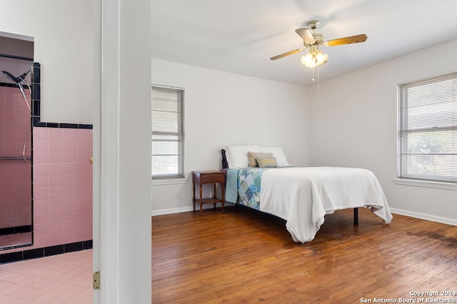 bedroom featuring wood-type flooring and ceiling fan