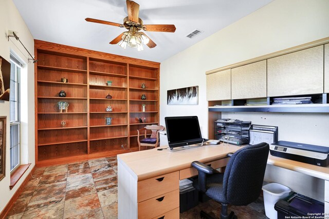 tiled dining area featuring ceiling fan