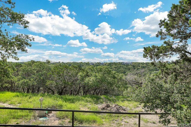 back of property with a wooden deck and central air condition unit