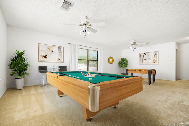 rec room featuring a textured ceiling, light colored carpet, billiards, and ceiling fan