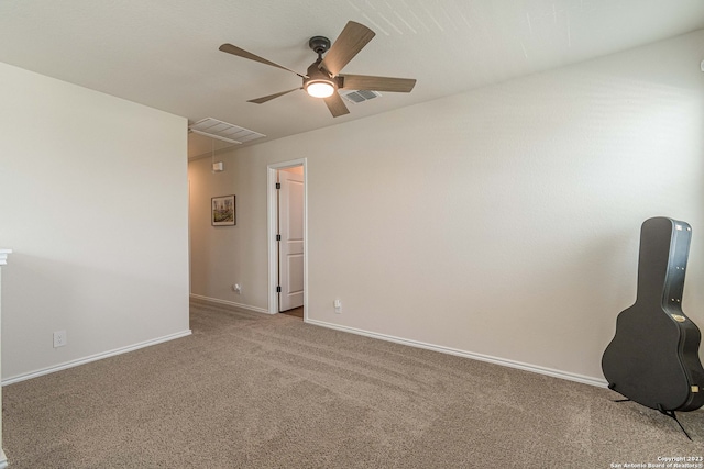 interior space with carpet floors and ceiling fan