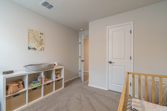 bedroom with light carpet