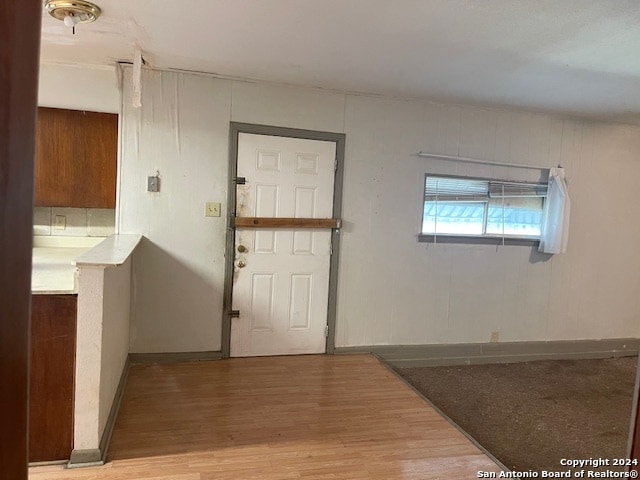 foyer with hardwood / wood-style floors