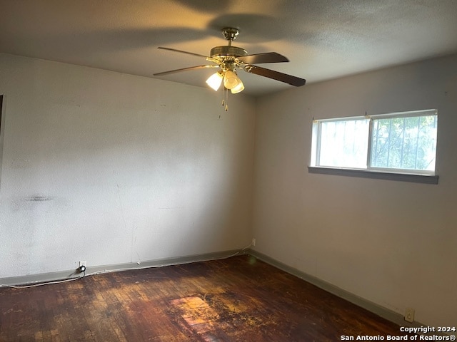 unfurnished room featuring wood-type flooring and ceiling fan