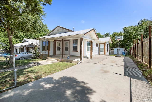 bungalow-style home featuring covered porch