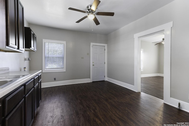 kitchen featuring sink, dark hardwood / wood-style floors, and ceiling fan