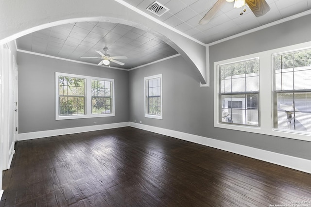 unfurnished room with crown molding, ceiling fan, and dark hardwood / wood-style flooring