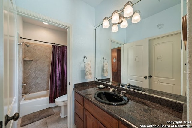 full bathroom with vanity, shower / tub combo with curtain, tile patterned floors, and toilet