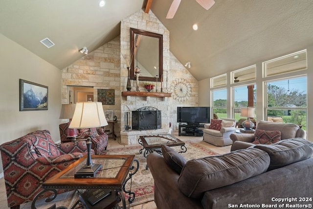 living room featuring a fireplace, high vaulted ceiling, and beamed ceiling