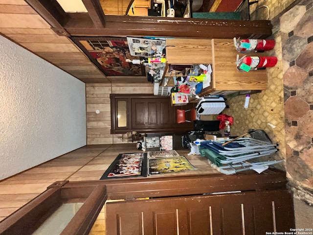 bar featuring dark brown cabinetry