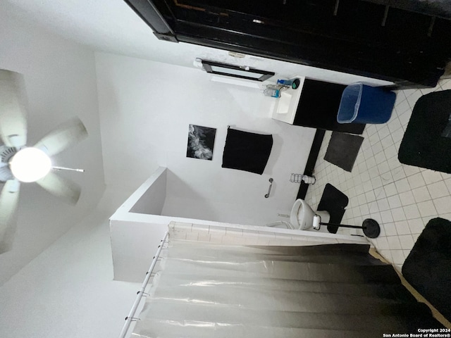 bathroom with ceiling fan