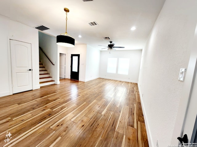 interior space featuring hardwood / wood-style flooring and ceiling fan