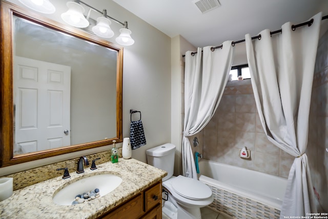 full bathroom with shower / tub combo, toilet, and vanity