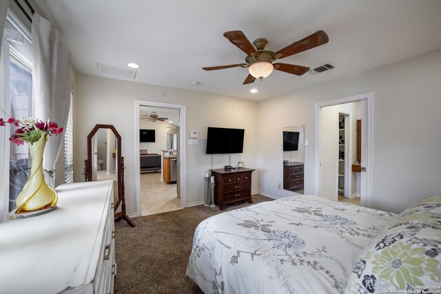 carpeted bedroom with ceiling fan