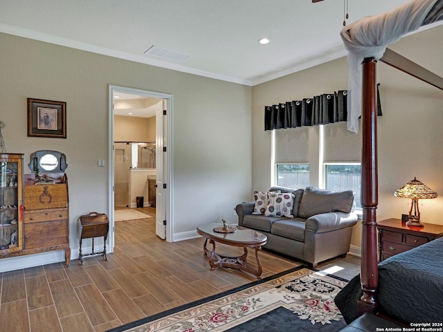 living room featuring wood-type flooring and ornamental molding