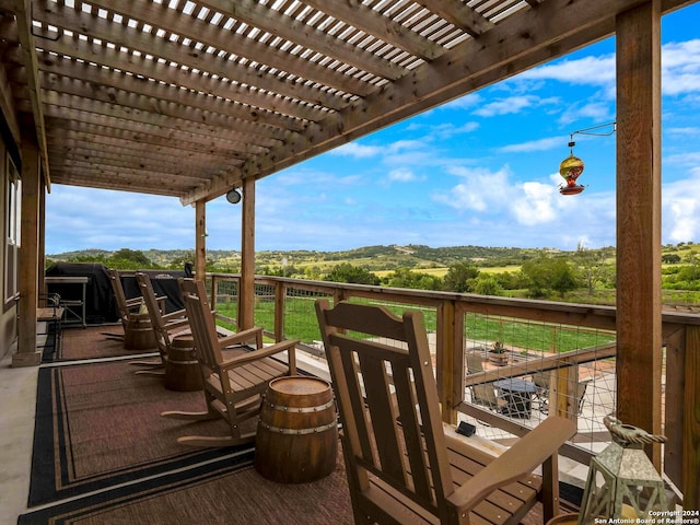 deck featuring a pergola