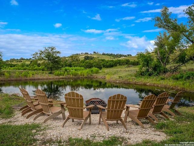 view of patio featuring a water view