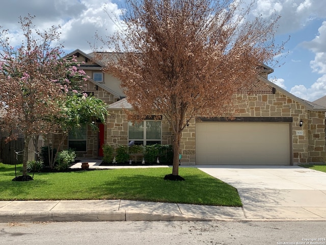 obstructed view of property featuring a front yard