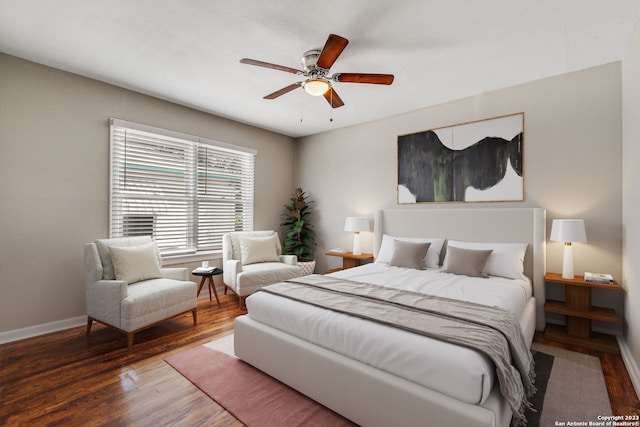 bedroom featuring hardwood / wood-style flooring and ceiling fan