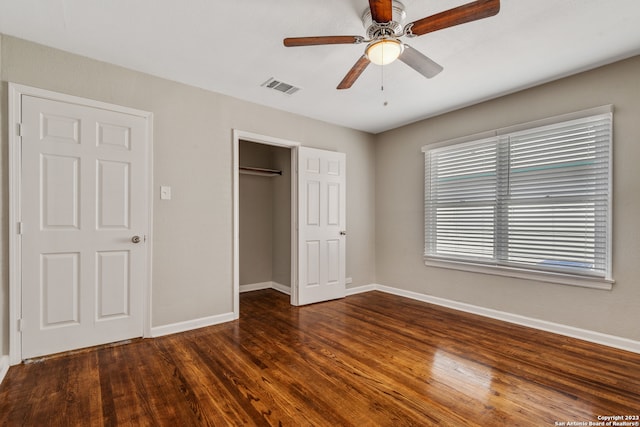 unfurnished bedroom with wood-type flooring and ceiling fan