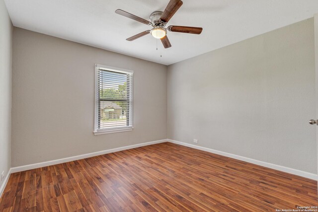 unfurnished room featuring wood-type flooring and ceiling fan