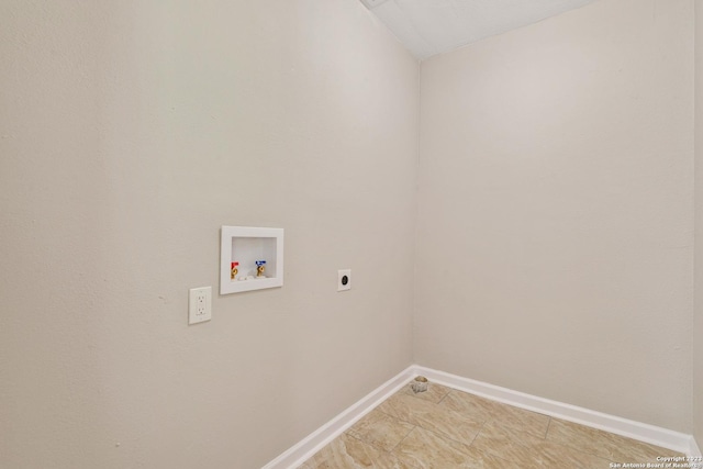 clothes washing area with hookup for a washing machine, baseboards, laundry area, and electric dryer hookup